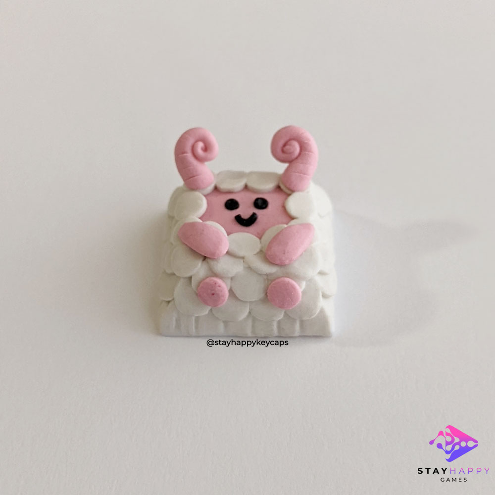 Front view of pink sheep demon artisan keycap.