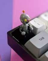 SladeByBlade Robot Artisan Keycap on a mechanical keyboard side view.